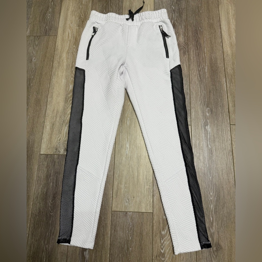 #1) Women's White and Black Herring pants.